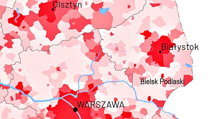 Północno-wschodni fragment mapy Polski z oznaczonymi granicami gmin. W odcieniach czerwieni oznaczone dane z rankingu. Na mapie widać podpisane cztery miasta: Warszawa, Olsztyn, Białystok i Bielsk Podlaski.