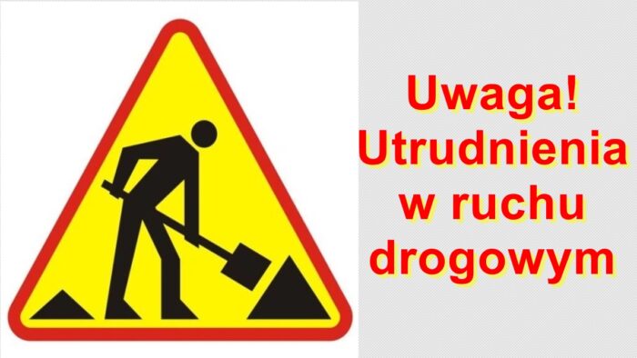 Znak drogowy "prace drogowe" oraz napis "Uwaga! Utrudnienia w ruchu drogowym".