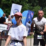 Zawody w nordic walkingu w lesie grabowieckim.