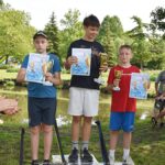 Wręczanie nagród na zakończenie zawodów wędkarskich.